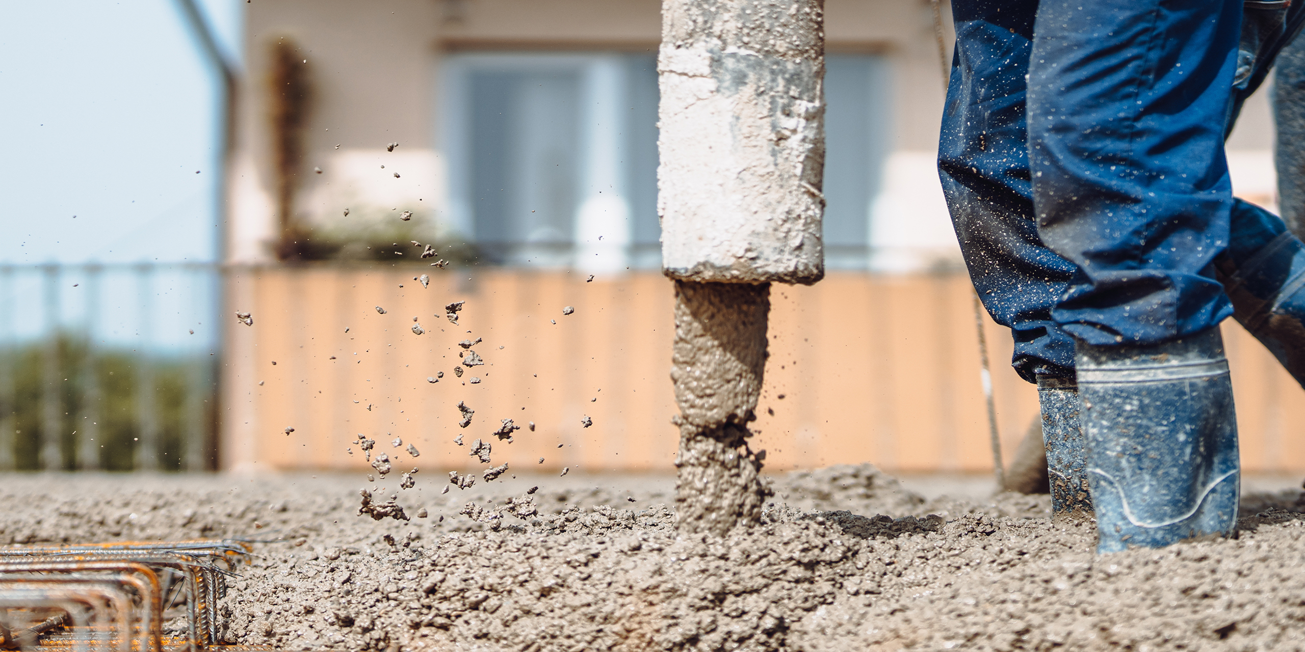 Concrete is poured over reinforcing steel