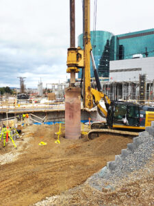 During construction of the Crystal Spring Tower - Drilling operations and caisson installation